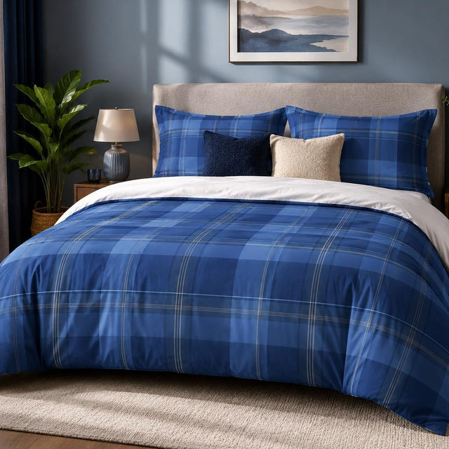 Royal Plaid duvet cover set, front view showing cobalt and navy tonal check with cream lines on a grey upholstered bed