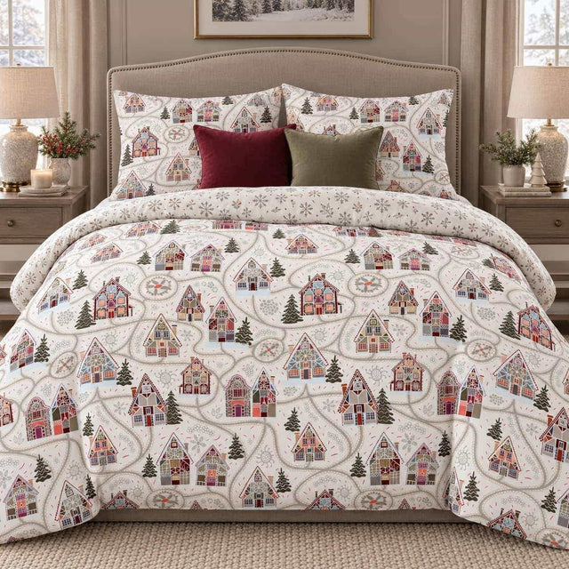 Winter Chalet Reversible Christmas duvet cover set, front view showing gingerbread chalets on cream with snowflake turn-down