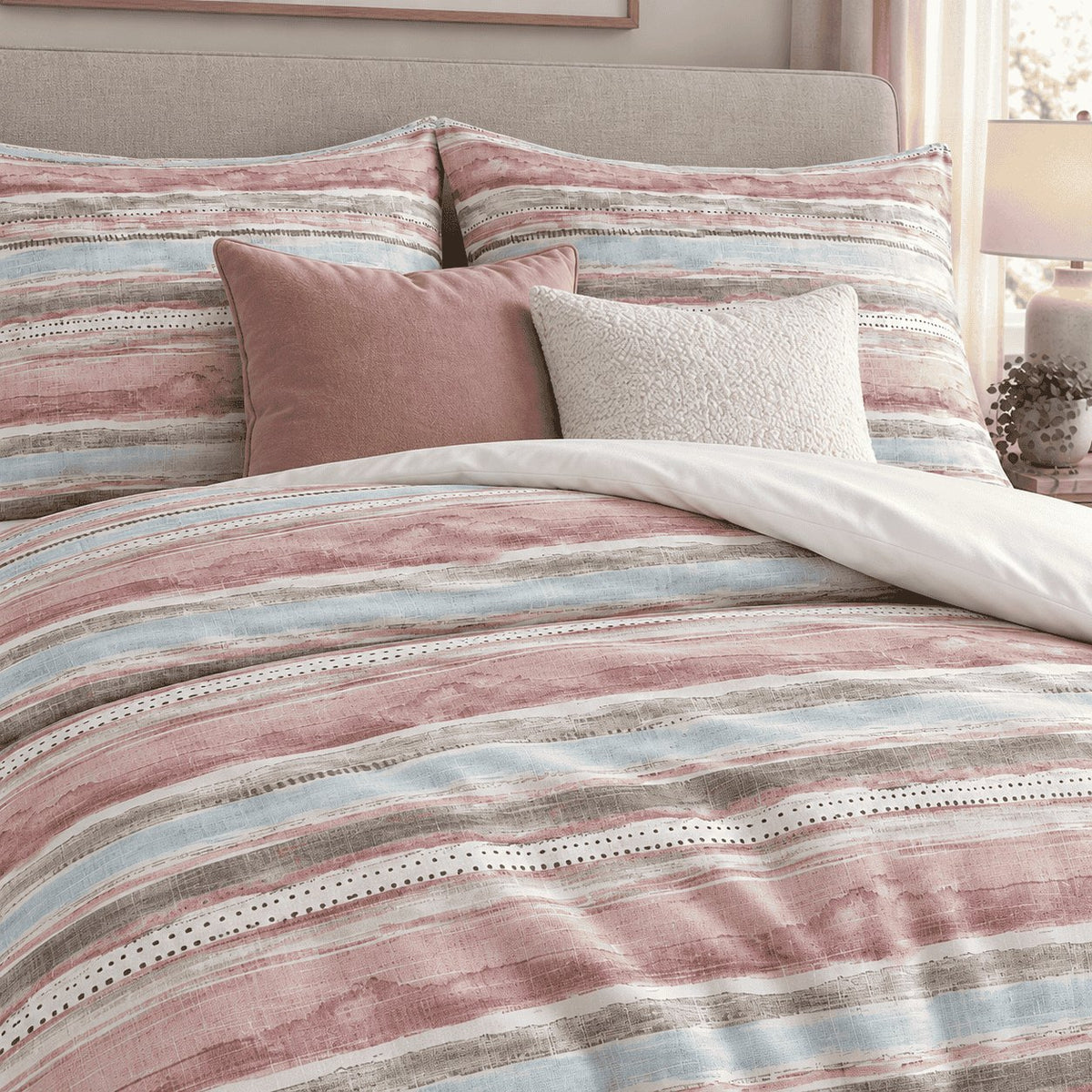 Blush Duck Egg Washed Stripe duvet cover set, pillowcase detail showing pillowcases with dusty pink and ivory cushions