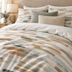 Caramel Sage Brushstroke duvet cover set, close-up showing dry-brush dashes in caramel, sage and bottle green