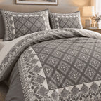 Charcoal Dove Framed Heritage duvet cover set, print detail showing grey medallion diamonds and lotus flowers