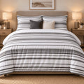 Charcoal Grey Stripe duvet cover set, front view showing grey banded pinstripes, charcoal and cream cushions