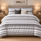 Charcoal Grey Stripe duvet cover set, front view showing grey banded pinstripes, charcoal and cream cushions