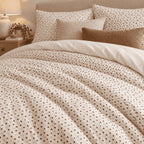 Cream Brown Triangle Lattice duvet cover set, close-up of print showing the brown triangle lattice on cream in raking light