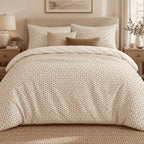Cream Brown Triangle Lattice duvet cover set, front view showing brown triangle speckle on cream with tan cushions