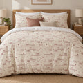 Cream Rose Retro Geometric duvet cover set, front view showing rose-red retro shapes on cream with two cushions