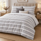 Dove Grey Dot Stripe duvet cover set, angled view showing narrow dotted grey bands and wide white gaps