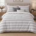 Dove Grey Dot Stripe duvet cover set, front view showing evenly spaced dotted grey stripes on white