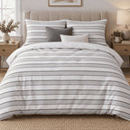 Dove Grey Dot Stripe duvet cover set, front view showing evenly spaced dotted grey stripes on white