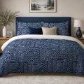 Indigo Floral Patchwork duvet cover set, front view showing white florals and stripes in indigo patches