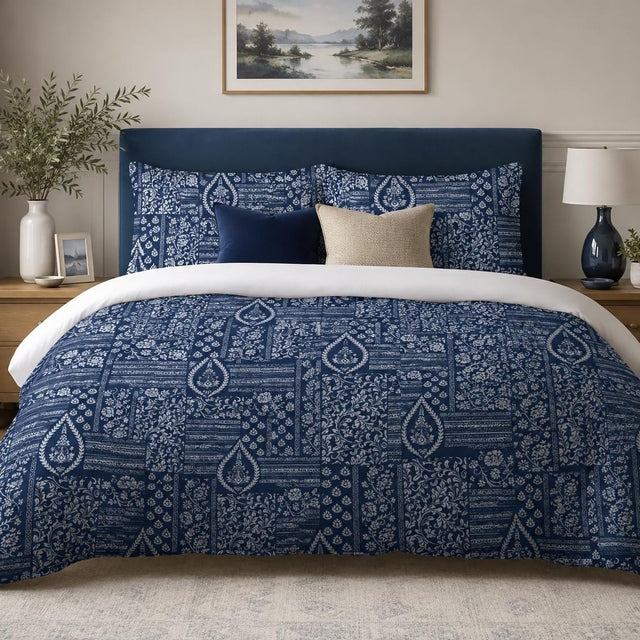 Indigo Floral Patchwork duvet cover set, front view showing white florals and stripes in indigo patches