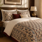 Ivory Burgundy Framed Heritage duvet cover set, border detail showing scrolling blue and burgundy vines beside the rosettes