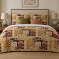Mediterranean Tile Patchwork duvet cover set, front view showing mustard and burgundy tiles with Jacobean flowers