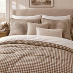 Mocha Gingham duvet cover set, close-up of pillowcases showing pillowcases behind taupe and cream bouclé cushions