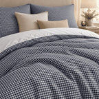Navy Gingham duvet cover set, close-up of print showing the small navy and white check across the duvet folds