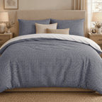 Navy Gingham duvet cover set, front view showing the navy check with two pillowcases and cream and sand cushions