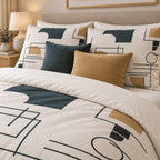 Navy Ochre Line Abstract duvet cover set, close-up of printed pillowcases with navy and ochre velvet cushions