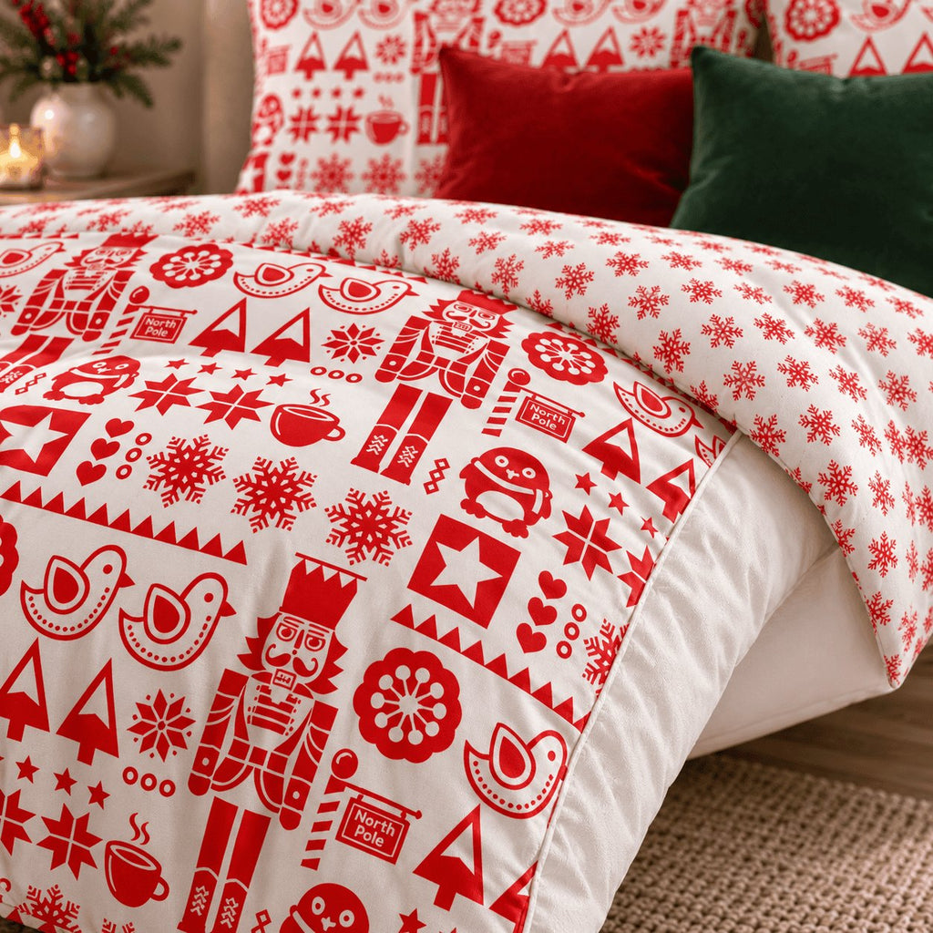 Nordic Christmas Reversible duvet cover set, print close-up showing nutcrackers, birds and North Pole signs by the reverse