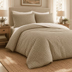 Olive Gingham duvet cover set, angled view showing the olive check draped onto a jute rug in sunlight