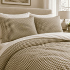 Olive Gingham duvet cover set, close-up of pillowcases showing olive gingham pillowcases above the turned-down duvet