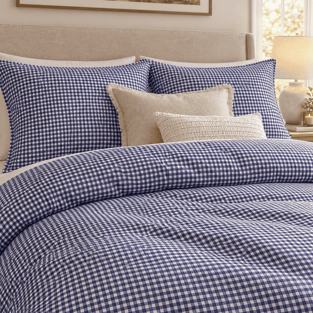 Royal Blue Gingham duvet cover set, close-up of pillowcases showing pillowcases behind fringed linen and knit cushions