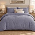 Royal Blue Gingham duvet cover set, front view showing the blue check with two pillowcases and oatmeal and cream cushions