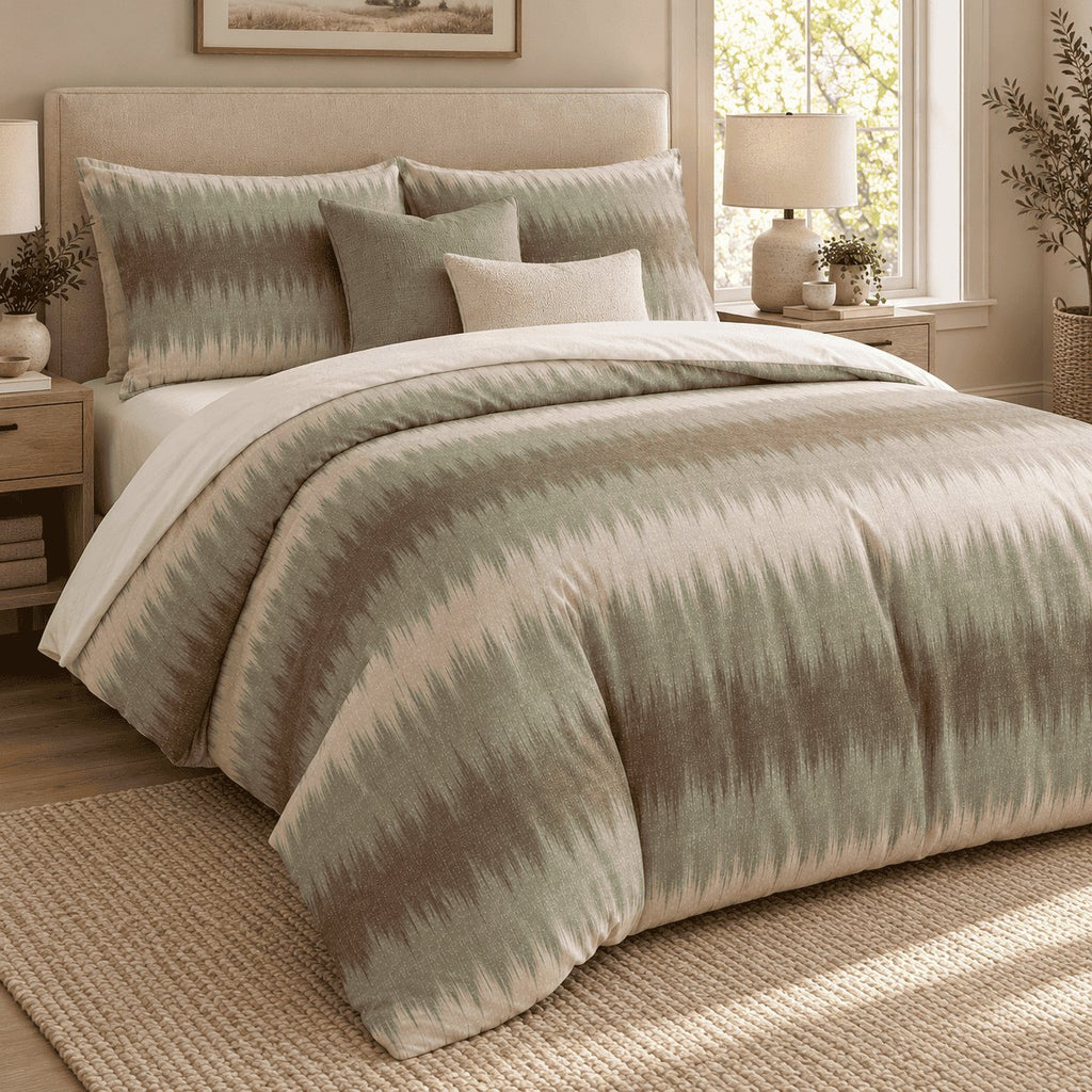 Sage Mocha Flame Stitch duvet cover set, angled view showing the flame-stitch bands beside a window