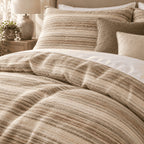 Sand Linen Texture Stripe duvet cover set, print detail showing slubbed sand, caramel and taupe streaks like washed linen