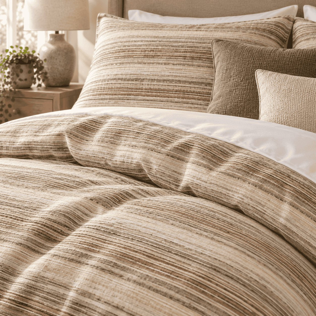 Sand Linen Texture Stripe duvet cover set, print detail showing slubbed sand, caramel and taupe streaks like washed linen