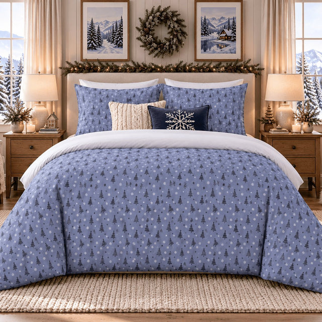 Serene Blue Christmas duvet cover set, front view showing the blue tree print with matching pillowcases and snowflake cushion