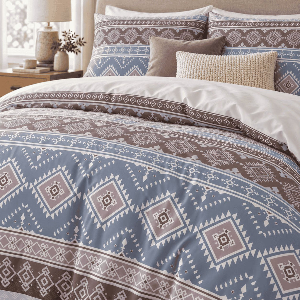 Slate Blue Aztec Stripe duvet cover set, print detail showing white stepped diamonds with mauve-taupe centres on slate blue