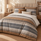 Slate Rust Woven Stripe duvet cover set, angled view showing space-dyed slate and rust bands on a jute rug