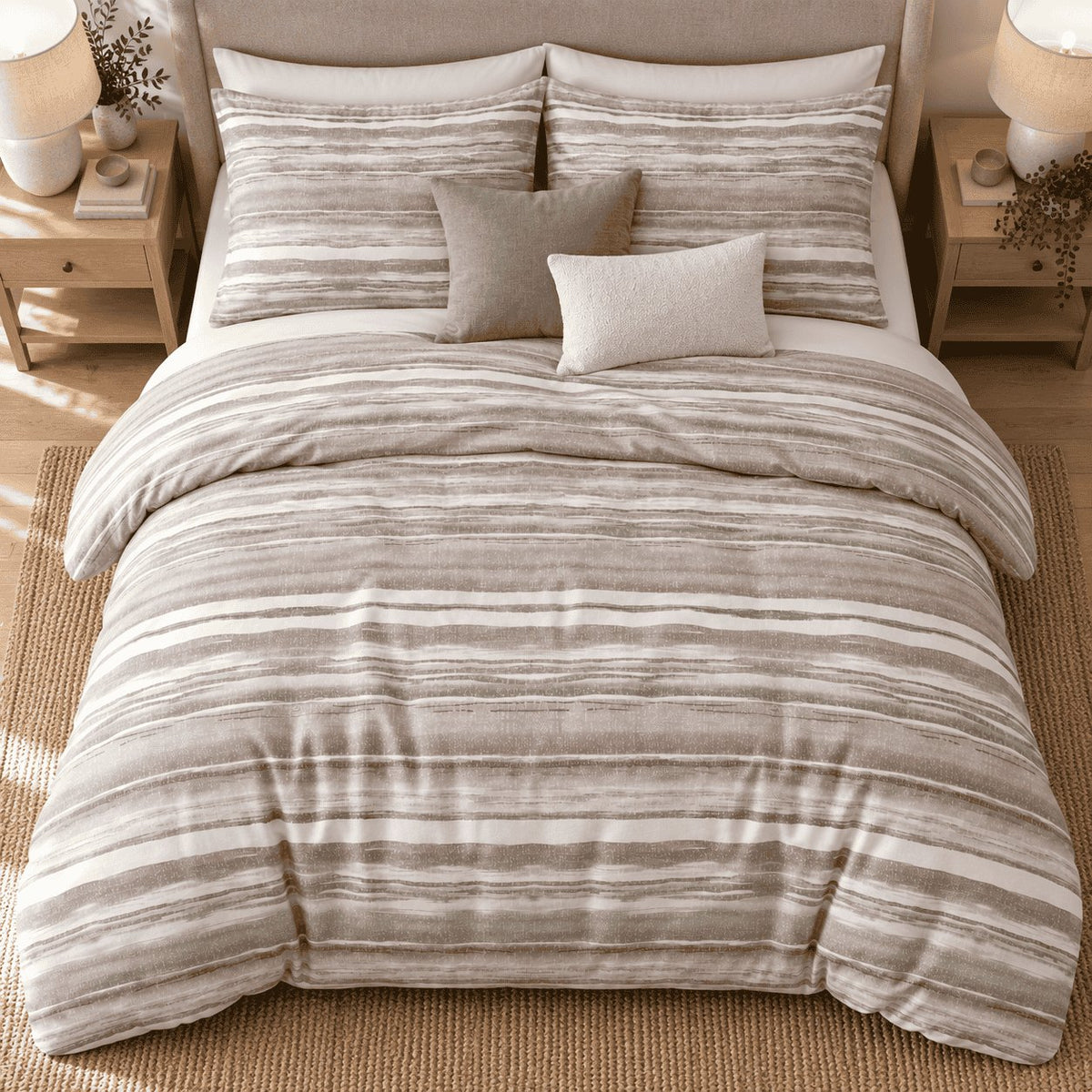 Stone Taupe Washed Stripe duvet cover set, overhead view showing taupe watercolour stripes on white