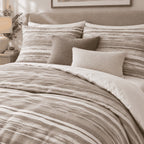 Stone Taupe Washed Stripe duvet cover set, pillowcase detail showing pillowcases with taupe linen and ivory bouclé cushions