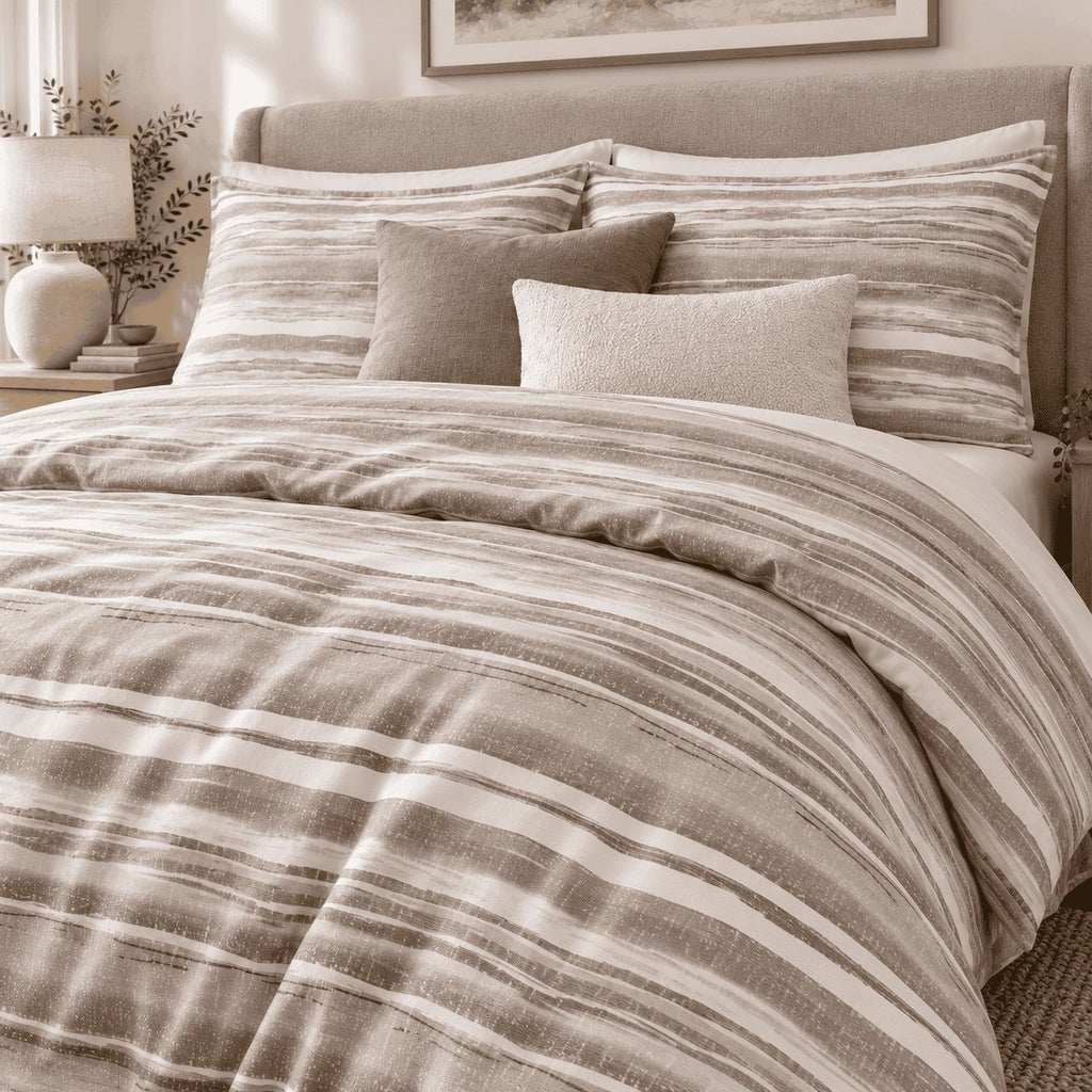 Stone Taupe Washed Stripe duvet cover set, turndown detail showing brushed taupe stripes with a speckled linen texture