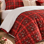 Tartan Snowflake Christmas duvet cover set, print close-up showing red check with white snowflakes and the white reverse