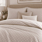 Taupe Diamond Trellis duvet cover set, close-up of pillowcases showing trellis pillowcases with sand and ivory cushions