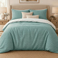 Teal Gingham duvet cover set, front view showing the teal check with two pillowcases and cream cushions