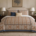 Terracotta Blue Framed Heritage duvet cover set, front view showing terracotta scroll tiles on cream with a blue edge