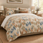 Terracotta Sage Ikat duvet cover set, angled view showing the earthy ikat print beside a window