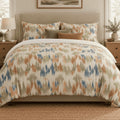 Terracotta Sage Ikat duvet cover set, front view showing terracotta, sage and blue ikat on a sand ground