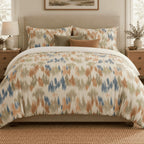 Terracotta Sage Ikat duvet cover set, front view showing terracotta, sage and blue ikat on a sand ground