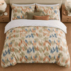 Terracotta Sage Ikat duvet cover set, overhead view showing the full ikat print with olive and rust cushions