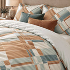 Terracotta Teal Abstract duvet cover set, close-up showing terracotta and teal bands with teal and rust cushions