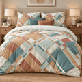 Terracotta Teal Abstract duvet cover set, front view showing diagonal terracotta and teal bands on a bed with ceramic lamps