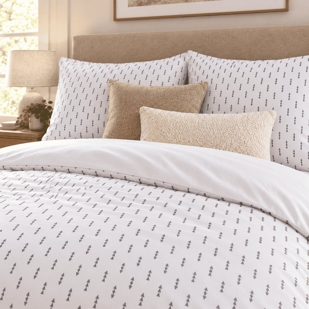 White Grey Triangle Arrow duvet cover set, close-up of print showing stacked grey triangles in vertical rows on white