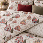 Winter Chalet Reversible Christmas duvet cover set, print close-up showing gingerbread chalets and snowflake reverse