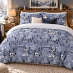 Winter Village Christmas duvet cover set, front angle view showing village duvet with navy and cream cushions